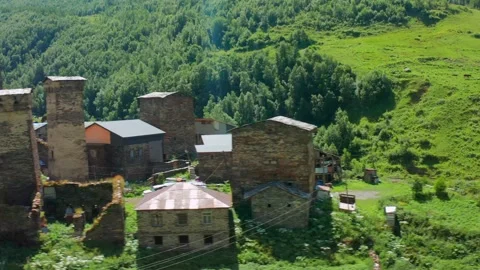 Svan tower district passes in circling aerial view through historic Chazhashi Vídeo Stock 343542288
