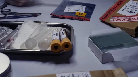 Swabs with blood sample to be analyzed in laboratory with UV light Video stock 107677000