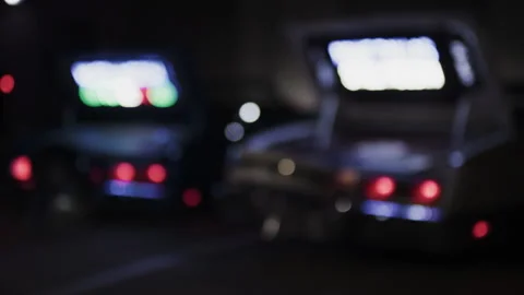 Swallow Depth of Field, Two Cadillac Cars, Retro Cars, 1990s, Night Time Stock Footage 253813916