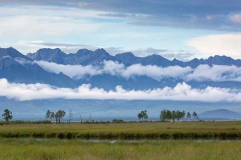 Swamp on the background of high mountains Foto stock