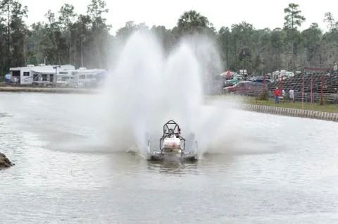 Swamp buggy with roostertails Stock Photos