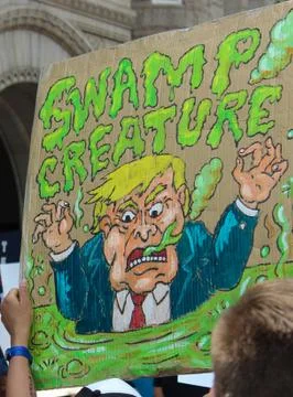Swamp Creature Trump Sign Stock Photos