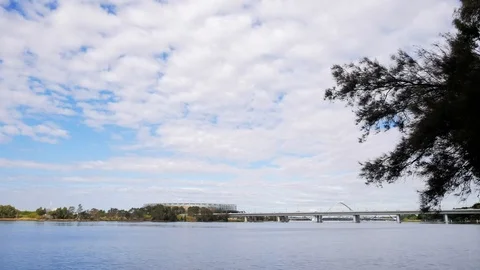 Swan river Optus stadium Perth clouds time-lapse 4k Stock Footage 108427948