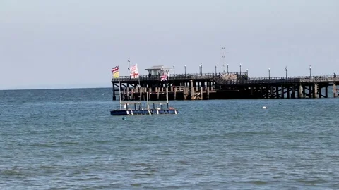 Swanage, sea, flags 스톡 동영상 137825772