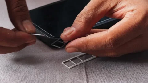 Swapping sim card Stock Footage 336671271