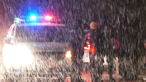 Swat agent during snowing night Stock Footage 100641735
