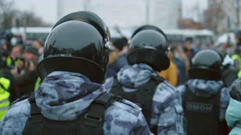 SWAT cops go event actions. Police in helmets. Special forces on protest strike. Video stock 147438720