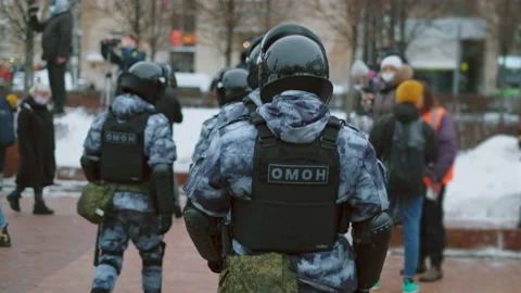 SWAT cops go event actions. Police in helmets. Special forces on protest strike. Stock Footage 147438818