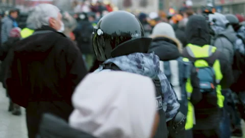 SWAT cops go event actions. Police in helmets. Special forces on protest strike. Video stock 147438889