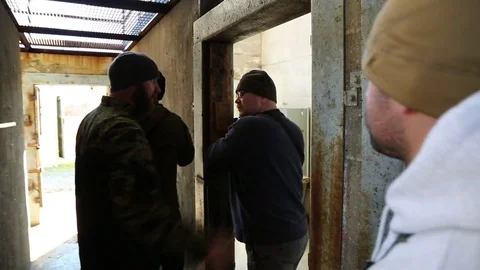 SWAT Instructor Directs Trainees in Exercise Stock Footage 70561579