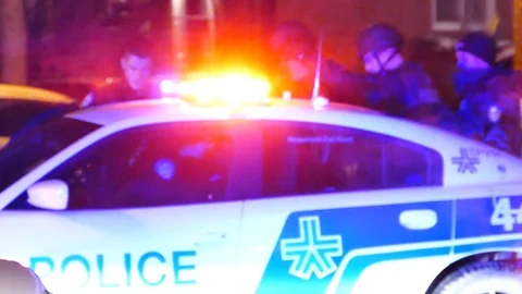 SWAT member putting suspect in custody Stock Footage 103290589
