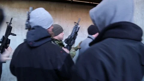 SWAT Members with Weapons Enter Open Hallway Stock Footage 70561462