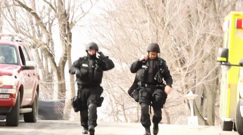 SWAT Paramedics walking towards camera Stock Footage 39765067