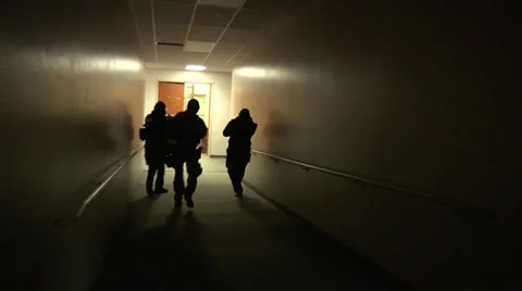 Swat Team clearing out some rooms Stock Footage 31993336