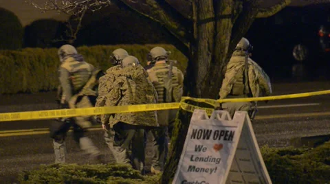 SWAT Team Responding After Shots Were Fired In A Neighborhood Stock Footage 35327552