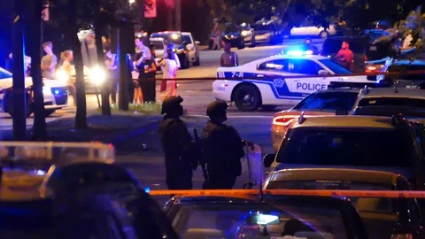 Swat team on-scene of an intervention Stock Footage 99842094