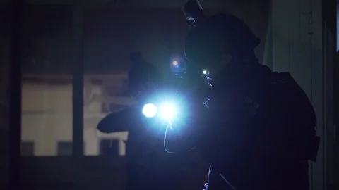SWAT team walking on corridor ready for action Stock Footage 110713643