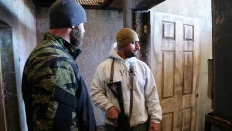 SWAT Trainee Receives Direction from Instructor Stock Footage 70561120