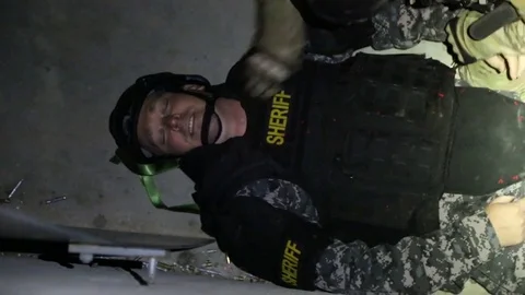 SWAT Trainees Prepare Wounded Trainees in Exercise Stock Footage 70562558