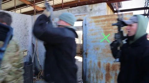 SWAT Trainees with Weapons Stand in line in Training Exercise Stock Footage 70561396