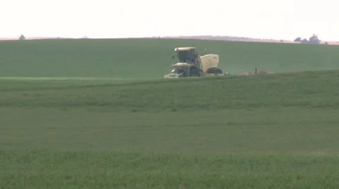 Swather Over Hill Video stock 45519588