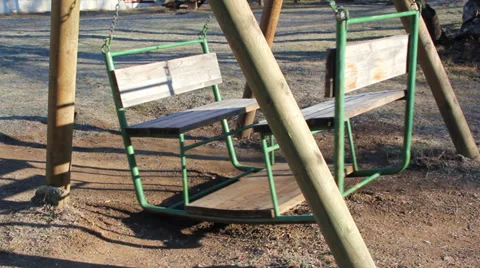 Swaying empty swing in a park. Stock Footage 34976608