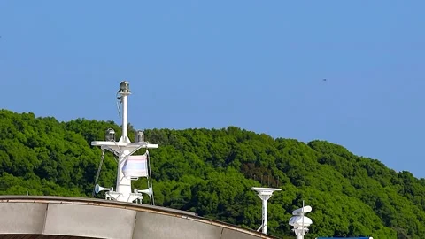 Swaying Ferry Pole on Pier with Greenery and Blue Sky Copy Space,4K 库存影片 344978000