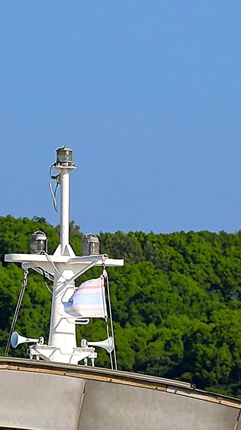 Swaying Ferry Pole on Pier with Greenery and Blue Sky Copy Space,Vertical Vidéo 344978100