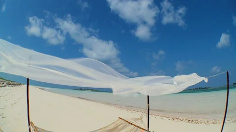 Swaying Hammock Over Paradise Beach Stock Footage