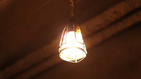 Swaying Lamp in Basement Stock Footage 46127972