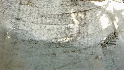 Swaying piece of polypropylene sways in the wind. Stock Footage 220383915
