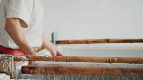 Swaying the Screen The Art of Sheet Forming in Xu Video stock 339080169