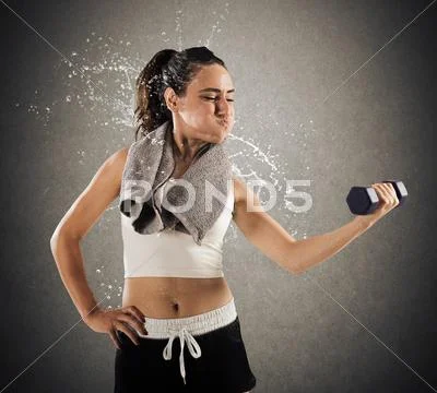 Sweat and toil at gym Stock Photos