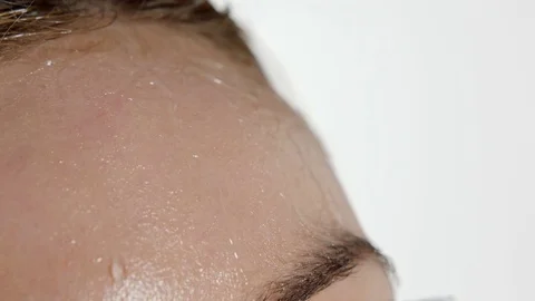 Sweat on forehead Stock Footage 75604448