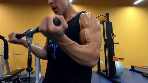 Sweat muscular man workout his biceps Stock Footage