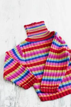 Sweater with colored stripes Stock Photos