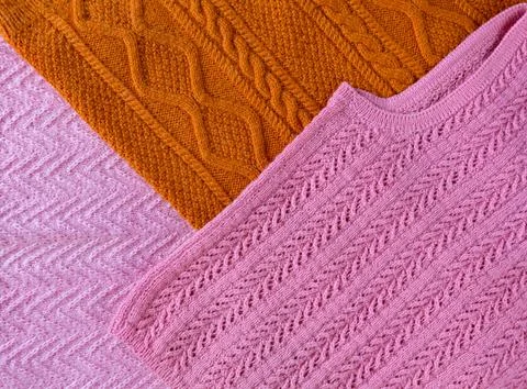 Sweaters with different knitting patterns. Foto stock