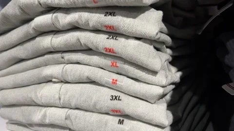 Sweatshirts Of Different Sizes In The Store Stock Footage 267725909