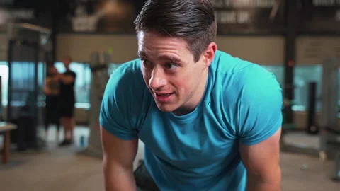 Sweaty Man Taking Break From Working Out In Gym | Slow Motion Stock Footage 167284568