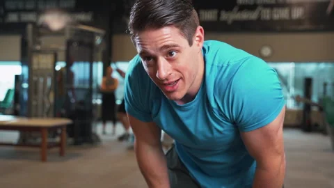 Sweaty Man Taking Break From Working Out In Gym | Slow Motion Stock Footage 167284706