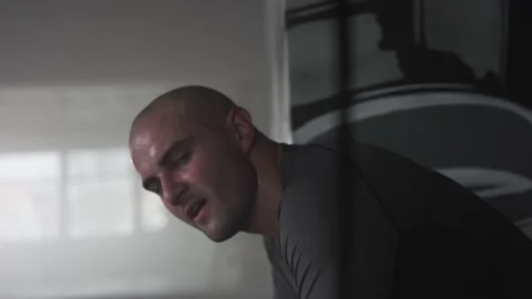 Sweaty Tired Fighter Looking at Camera After a Workout Stock Footage 174927687