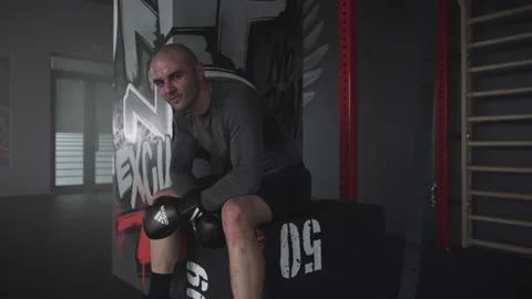 Sweaty Tired Fighter Looking at Camera After a Workout Stock Footage 174927692