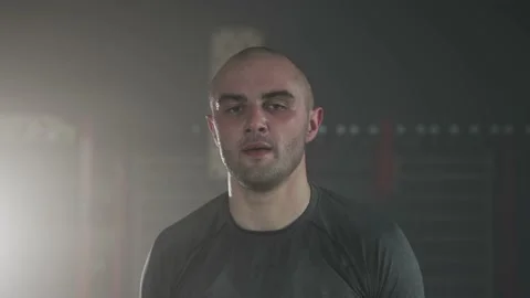 Sweaty Tired Fighter Looking at Camera After a Workout Stock Footage 174929066