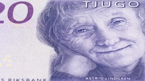 Sweden 20 krona note tracking. Swedish money background. Low angle, macro. 8K Stock Footage 125242857