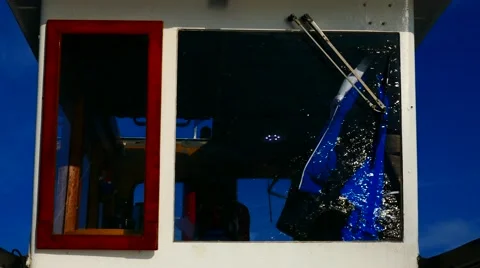 SWEDEN: Reflection of moving water on the window of the ship control room Stock Footage 64002604