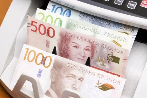 Swedish Crown in the counting machine Stock Photos