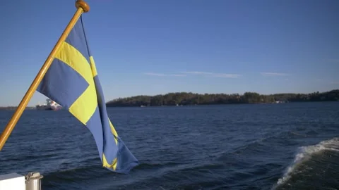 Swedish flag blowing in the wind Stock Footage 242487134