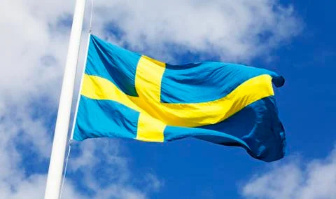 Swedish flag blows in the wind Stock Photos