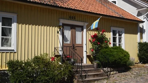 Swedish flag on a wall Stock Footage 94367443