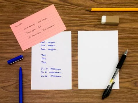 Swedish; Learning New Language Writing Words on the Notebook Stock Photos